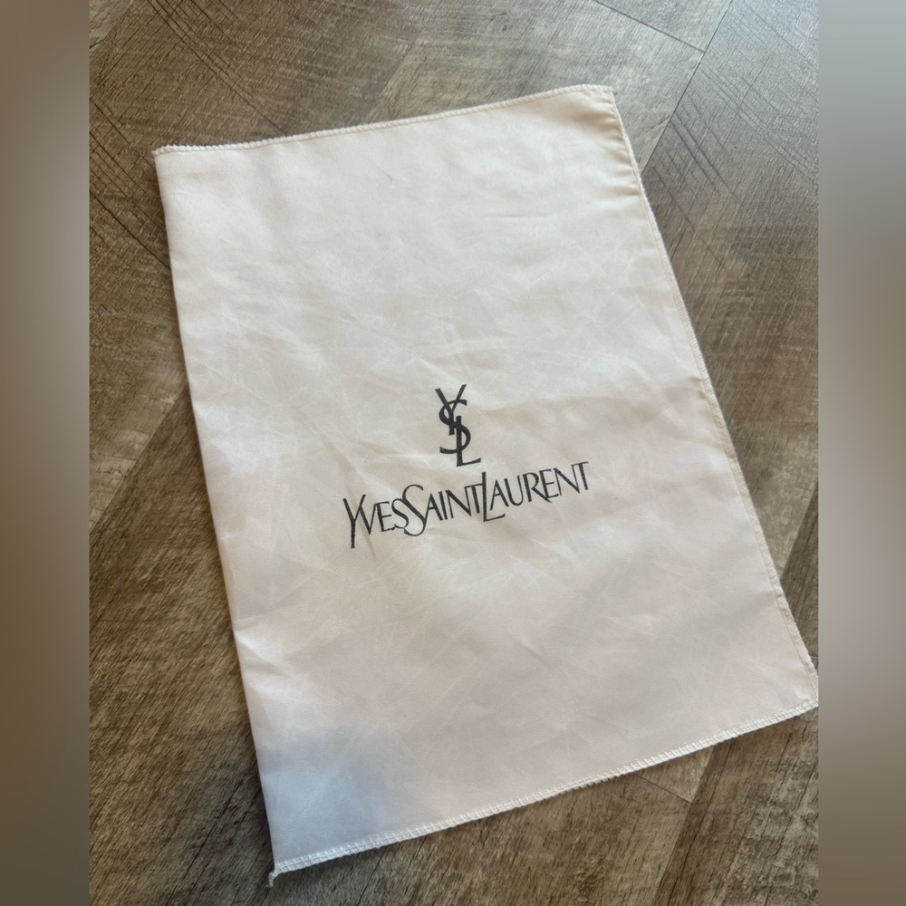 Yyves Saint Laurent cloth bag (from wristlette)